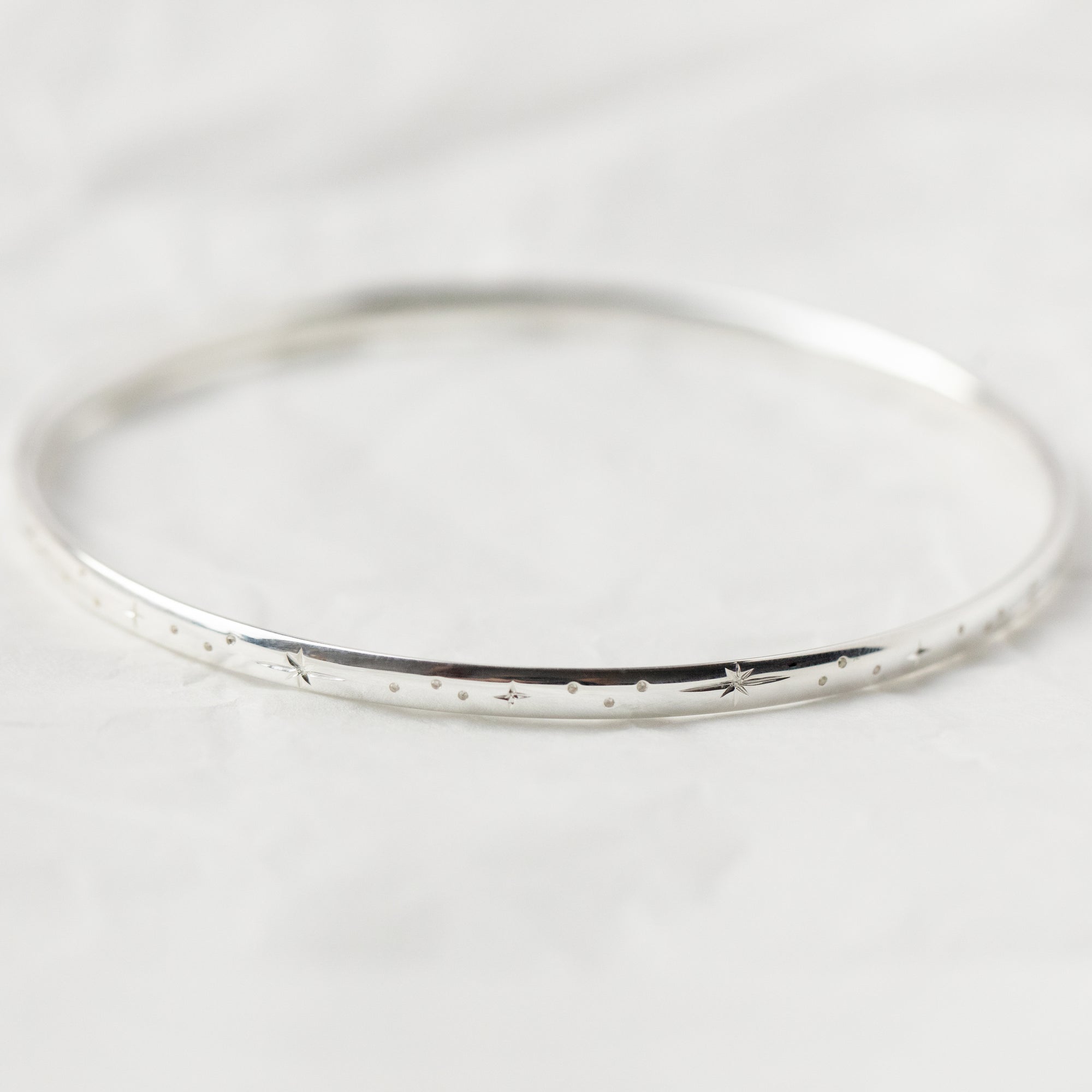 Star Engraved Bangle