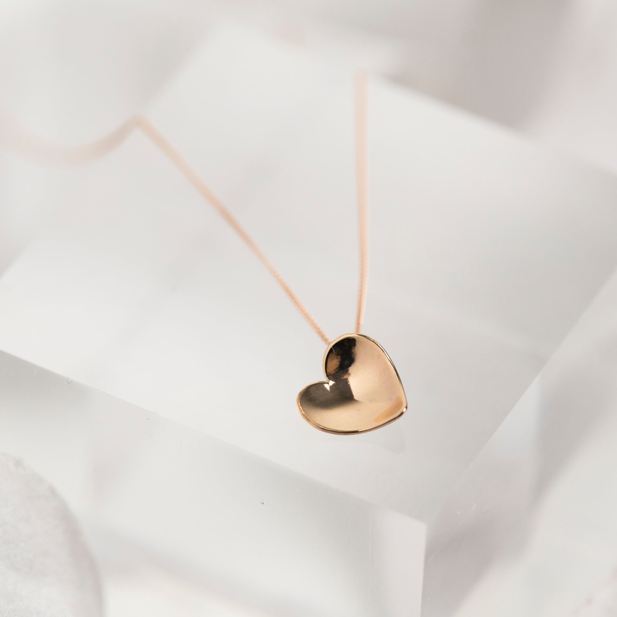 Solid 9 carat rose gold concave heart necklace